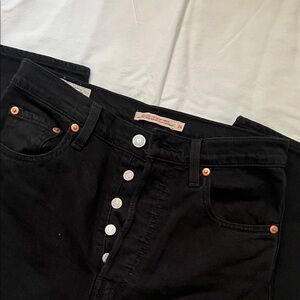 Levi's High Rise Black Jeans with Button Detail